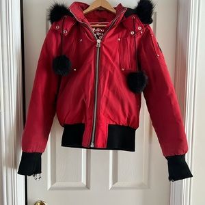 Red moose knuckle with black fur trim